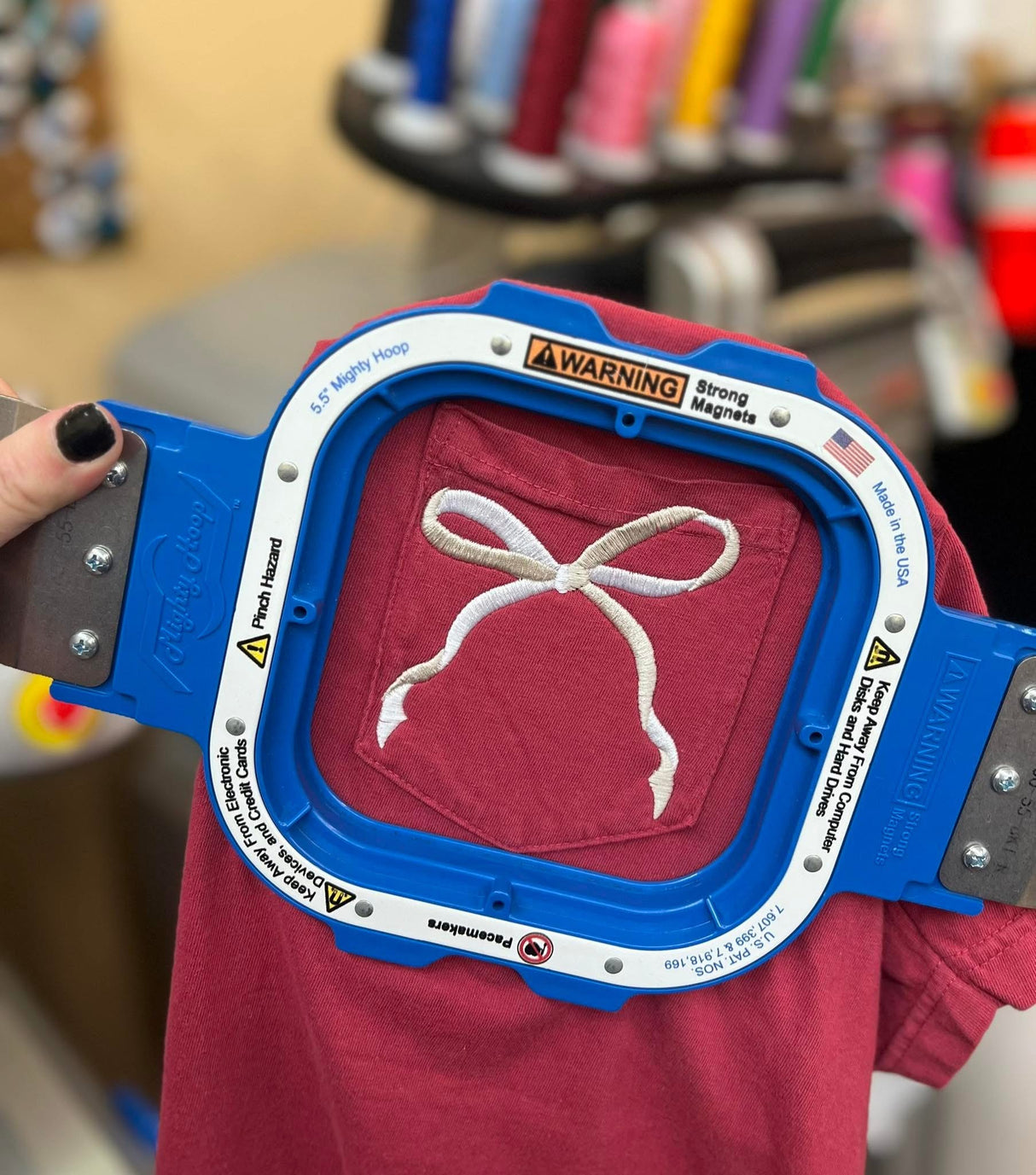 Pocket Bow Embroidered on a Port & Co Soft Style T-shirt