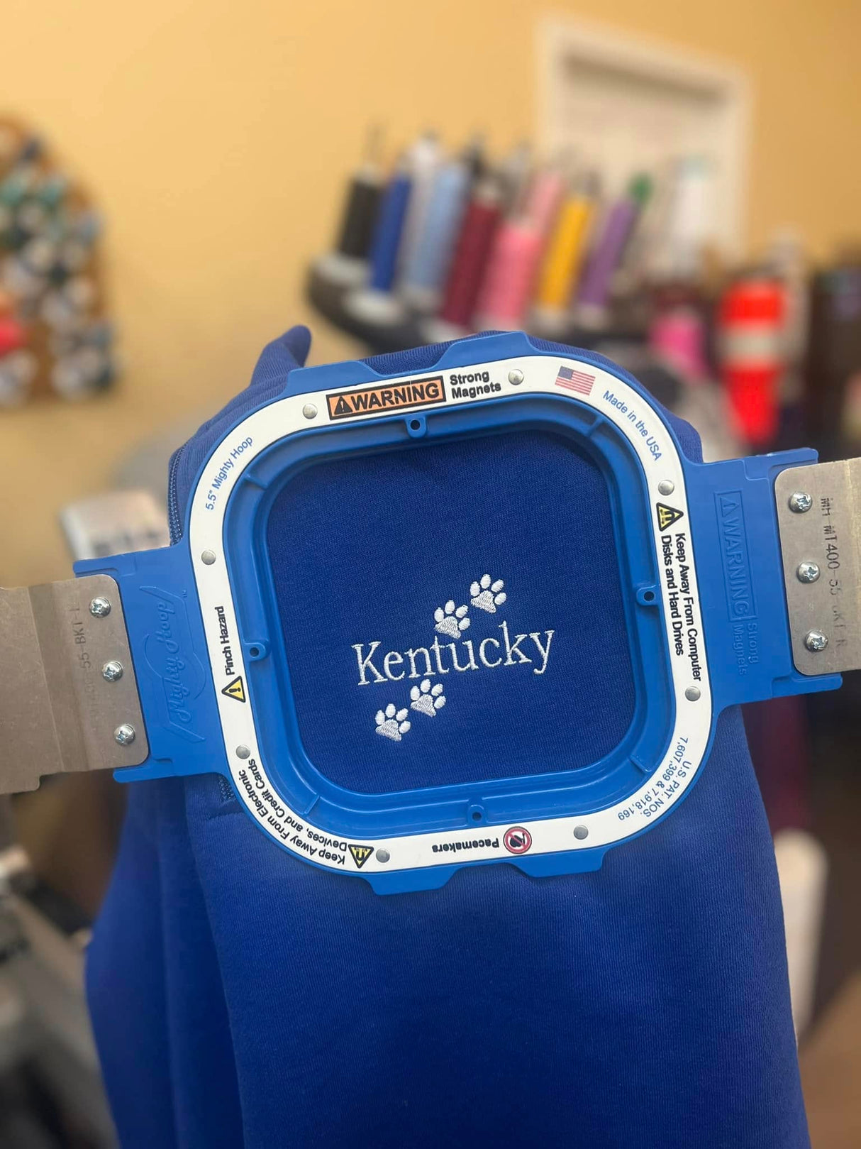 Kentucky Paws Embroidered on a Sport-Tek 1/4 Zip Sweatshirt
