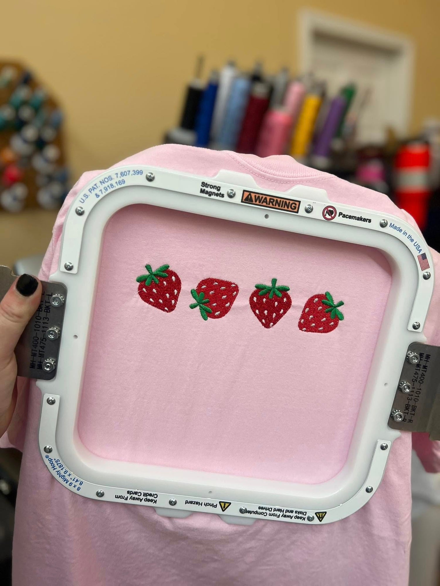Strawberries Embroidered on a Port & Co Soft Style T-shirt