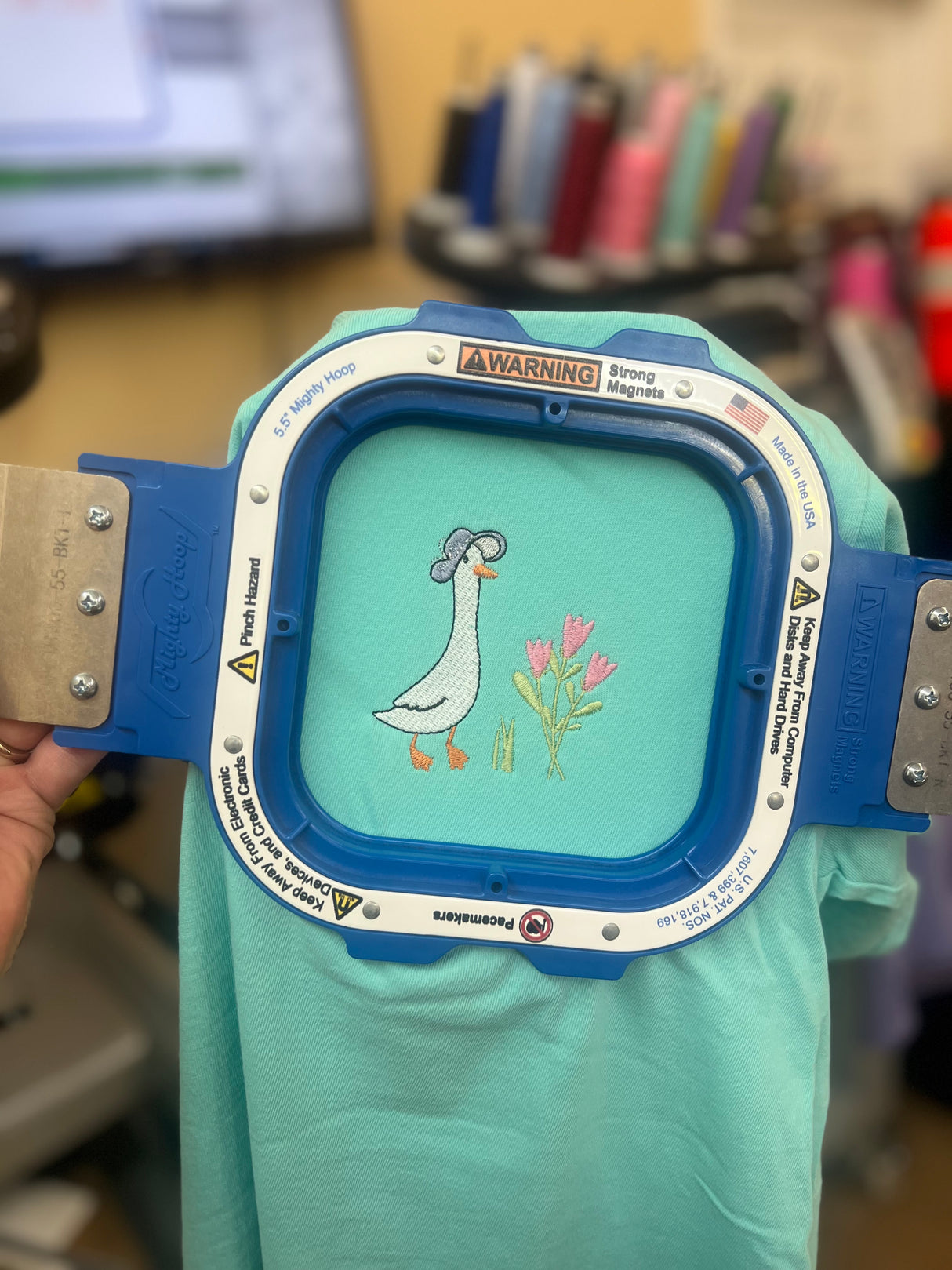Spring Goose Embroidered on a Port & Co Soft Style T-shirt